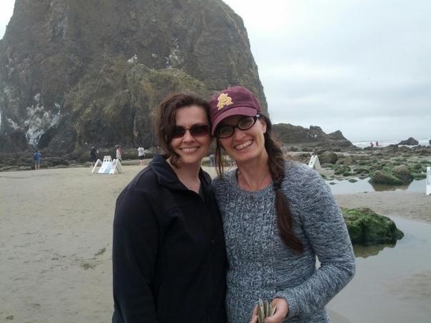 Allison and me at the Haystack, Cannon Beach, Oregon.  What a gorgeous beach -- with wide, flat, finely-sanded expanses, punctuated by massive boulders and fascinating tide pools.  I *think* I saw a puffin.  I also realized that this sweater I dearly love makes me look pregnant.  Love/not-love.